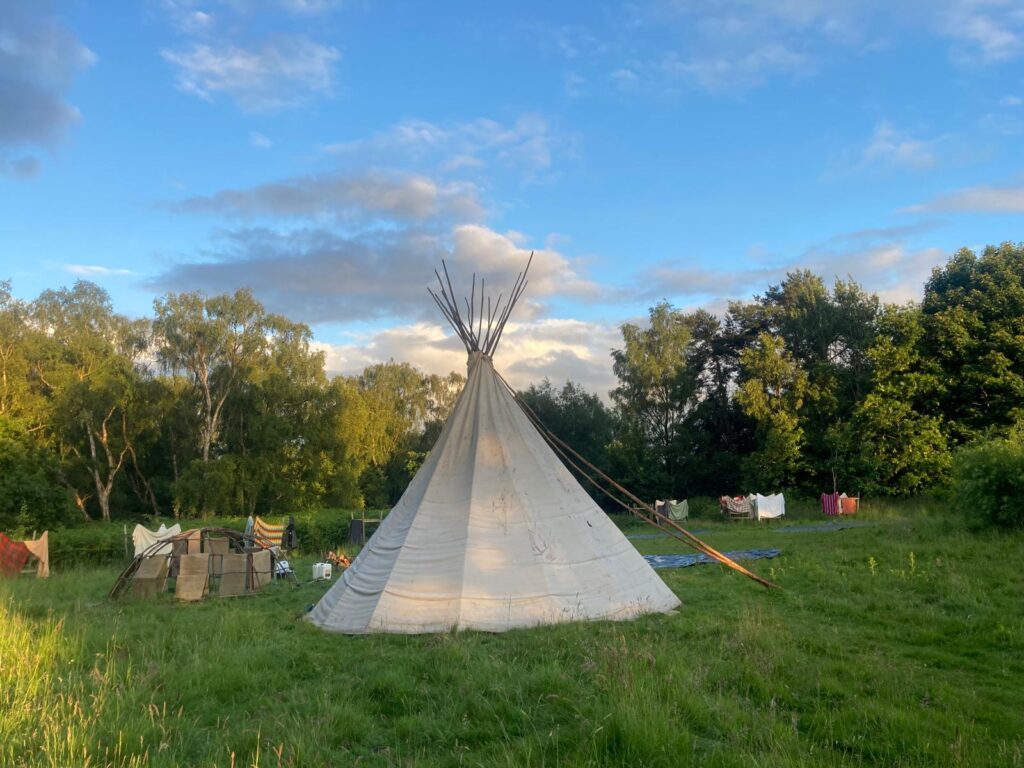 Tipi and blue skies