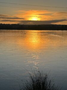 Sun rise reflected over lake
